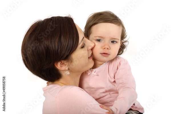 Fototapeta Eine Mutter liebkost ihre Tochter