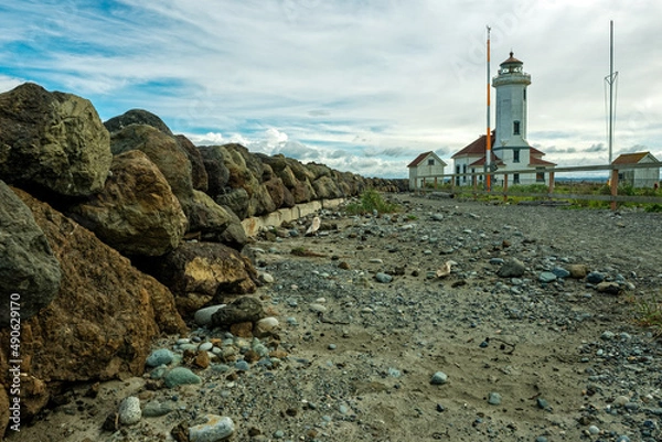 Obraz A rocky path leads to the Point Wilson Lighthouse in Fort Worden State Park, Washington, USA