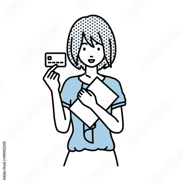 Fototapeta 立って書類とカードを手に持つオフィスカジュアルの女性