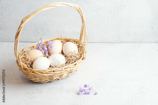 Fototapeta easter composition on a light concrete background, easter concept