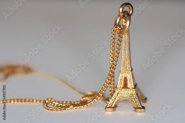 Fototapeta small gold souvenir of eiffel tower