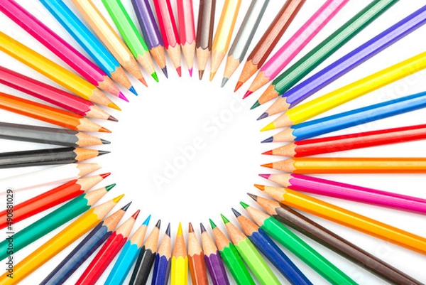 Fototapeta Colored pencils for drawing on a white background. Education and creativity. Leisure and art