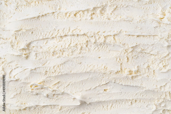 Fototapeta Delicious and refreshing vanilla ice cream surface. Top view. Summer season