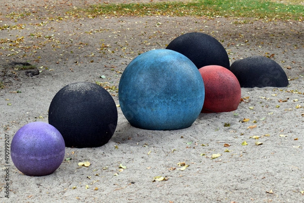 Fototapeta Large colorful balls in a playground