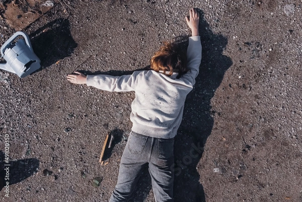 Obraz dead body the corpse of a teenage girl found using a drone in a landfill aerial survey to search for the missing