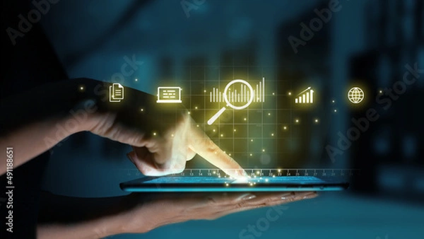 Fototapeta Data discovery concept. Magnifying glass and graph icons over tablet with persona.