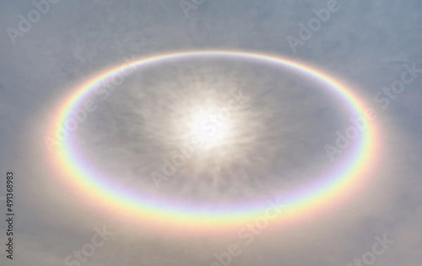 Obraz Circular rainbow cloud with amazing sunset