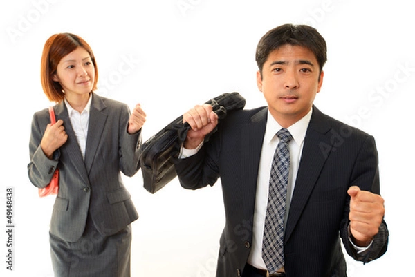 Fototapeta やる気に満ちあふれたビジネスマンとオフィスレディー