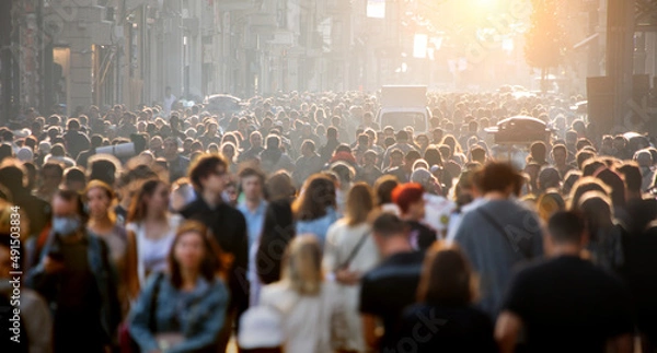 Fototapeta Blurred crowd of unrecognizable at the street