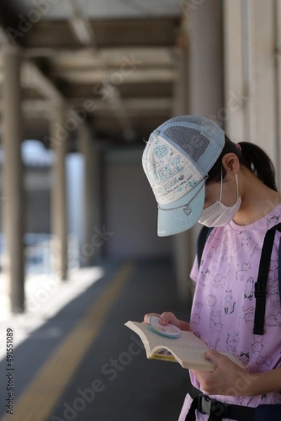 Obraz person reading a book