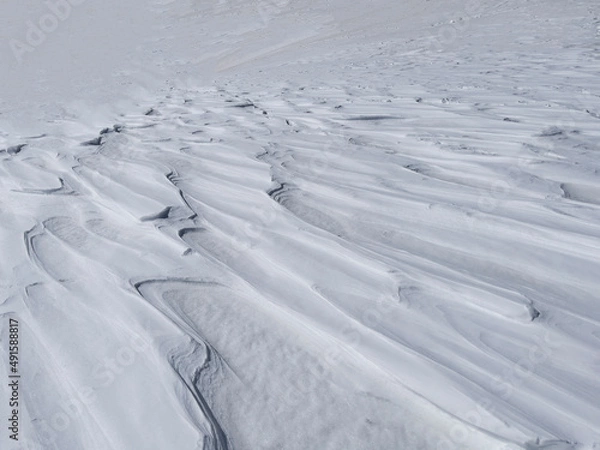Fototapeta snow patterns formed by heavy storms