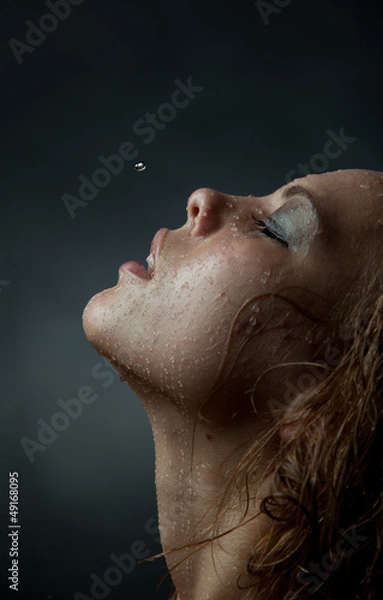 Obraz Portrait of a girl's face which water flows