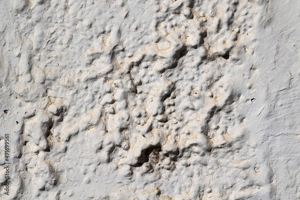 Fototapeta Cracked and abstract grunge texture. Aged material surface backdrop. Weathered effect pattern. Old and dirty background.