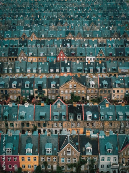 Fototapeta rooftops of Kartoffelraekkerne neighborhood, in Oesterbro, Copenhagen, Denmark. The neighbourhood built in the late 1800s for working class families is today one of the most sought for in Copenhagen