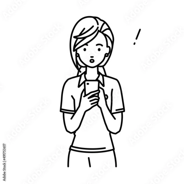 Fototapeta 立ってスマートフォンを操作して何かに気づいて驚いたポロシャツの女性