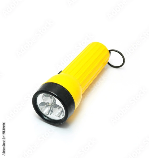 Fototapeta Yellow flashlight isolated on white background