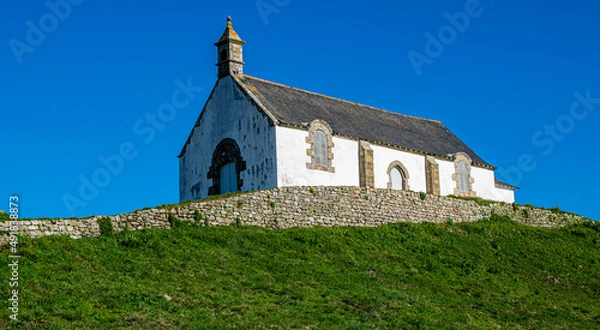 Obraz Carnac: Chapelle Saint Michel on the tumulus, located in Morbihan in Brittany, the town is also known for its alignments of 2,934 menhirs.