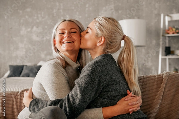 Obraz Mother hugging a Teenage Daughter At Home. family relations