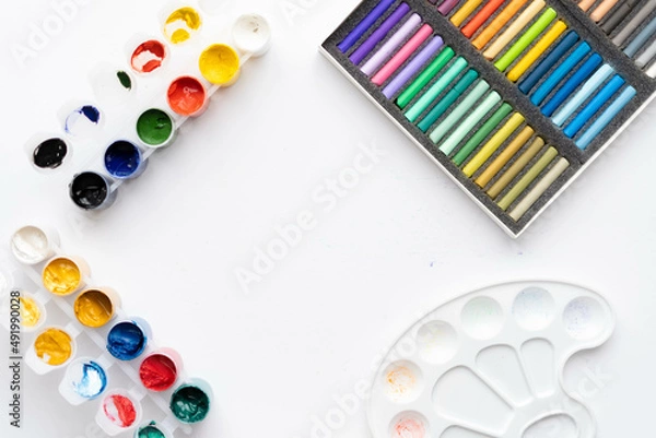 Obraz Flat composition set of artistic tools. Brushes, paints, pencils, pastels for drawing. Place for text.