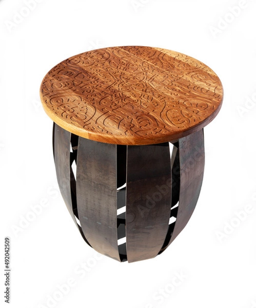 Fototapeta Stylish table of carved wood and metal, vintage and modern mix, isolated on white background.