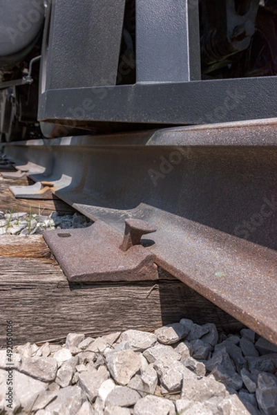 Obraz Railroad track and ties with spikes