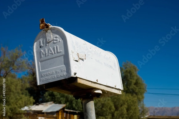 Obraz White retro metal rural mailbox with US Mail stamped in the front. 