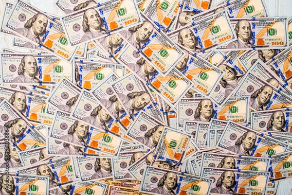Fototapeta American dollars as a background. Finance and banks. The growth of the dollar. The growth of the dollar.