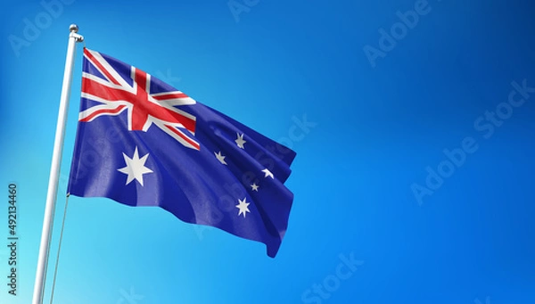 Obraz Australian Flag Flying on Blue Sky Background  3D Render