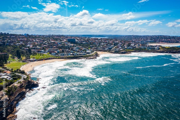 Fototapeta Aerial drone view of iconic Bronte Beach and Tamarama Beach coastline in Sydney, Australia during summer on a sunny day  