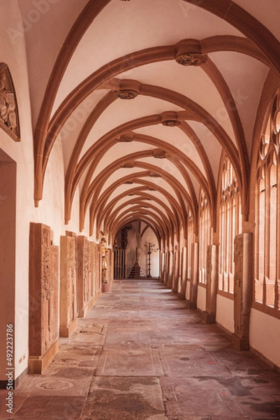 Fototapeta In W zburg, Germany on . View of Domstrasse towards the W rzburg Cathedral and in its lower part with the sculpture with the word love with vertical photography