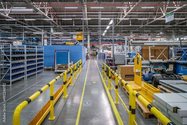 Obraz Storehouse interior with shelves and yellow pipeline