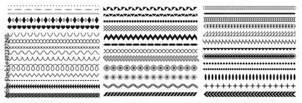 Fototapeta Geometric decorative line borders and divider designs. Vintage abstract frame wavy patterns, zigzags, rombs and circles. Illustration. Fashion ornament brushes vector set