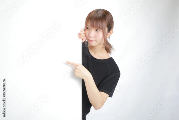 Obraz ボードから覗く女性