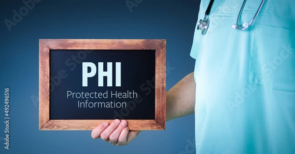 Fototapeta PHI (Protected Health Information). Doctor shows sign/board with wooden frame. Background blue