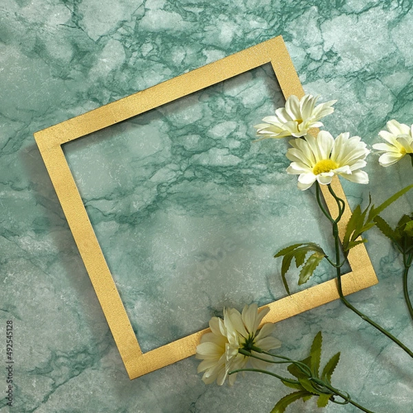 Fototapeta Bouquet of white daisy flower. Golden frame. Green marble background. Text space. Top view. Minimal style. Flowers, holidays.