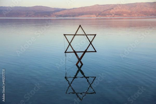 Obraz The Star of David known in Hebrew as the Shield of David or Magen David, taken on the dead sea. High quality photo