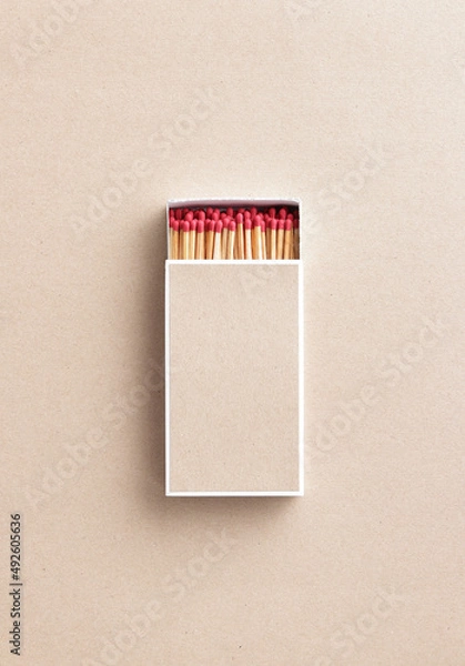 Fototapeta big size of matchbox on light brown paper background with copy space for text or image , matchbox background