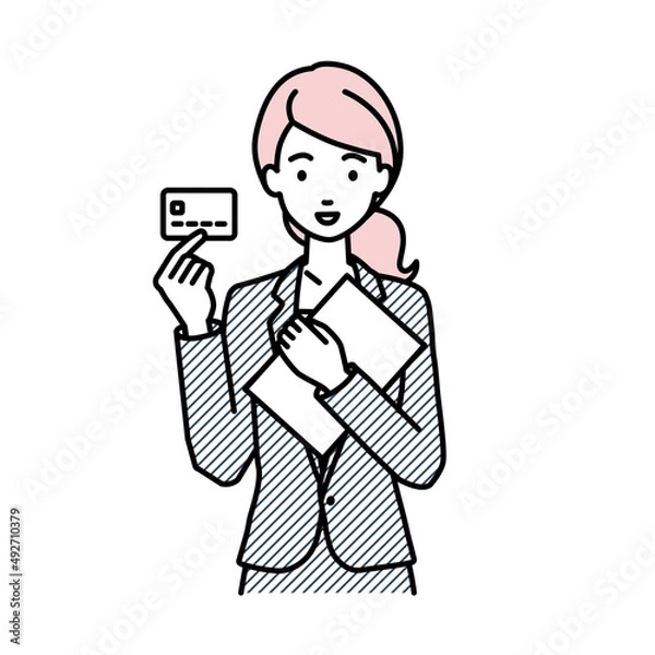 Fototapeta 立って書類とカードを手に持つビジネススーツの女性