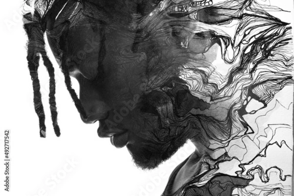 Fototapeta A profile portrait of a young man combined with black ink lines. Paintography.
