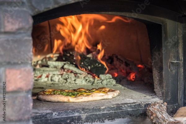 Obraz stone-baked pizza and oven