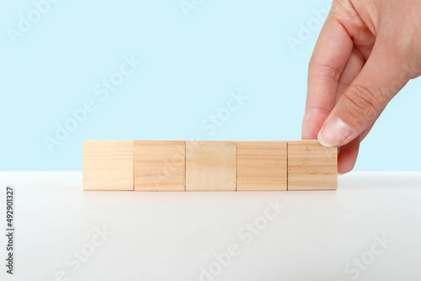 Obraz 積み木を置く