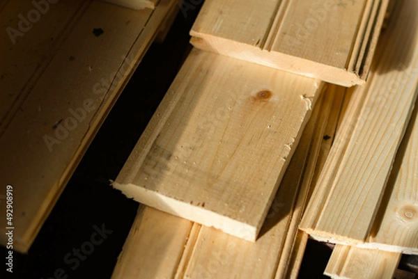 Fototapeta Carpentry wood work, wood material, work and concept of inflation, rising prices of materials.