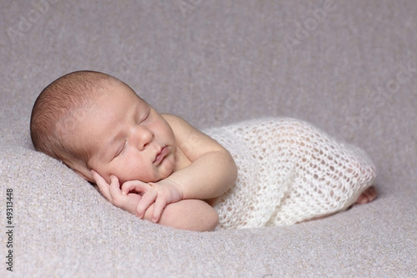 Obraz swaddled  sleeping baby