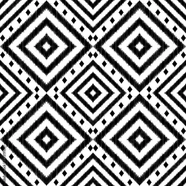 Obraz Ikat seamless pattern abstract black and white Ikat background seamless pattern for textile, wallpaper, card or wrapping paper