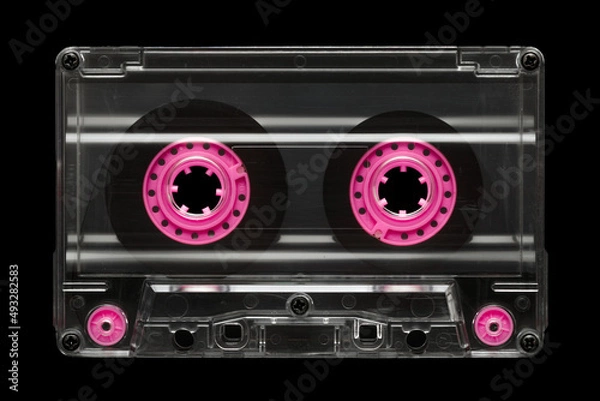 Fototapeta Old vintage audio cassette isolated on black background. Retro analog hifi music concept