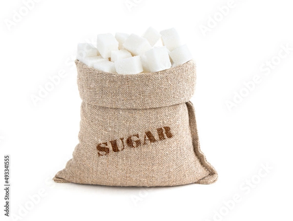 Fototapeta Sugar in a sack isolated on a white background. White Sugar in burlap sack. Cube Sugar in jute bag