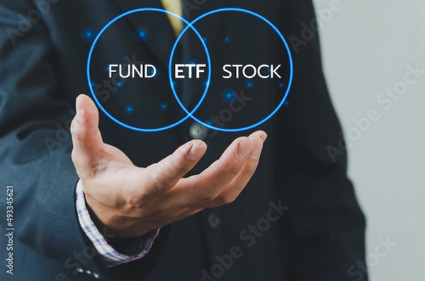 Fototapeta Hand businessman icon ETF Exchange Traded Fund virtual screen Internet Business stock market finance Index Fund Concept.