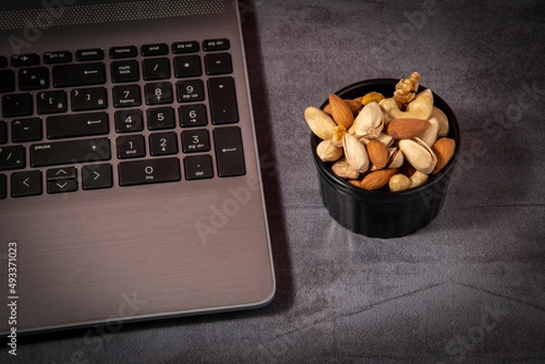 Fototapeta nuts and a computer