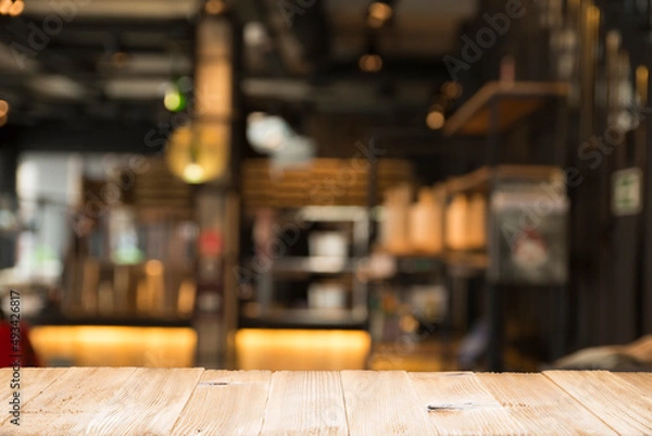 Obraz Empty dark wooden table in front of abstract blurred bokeh background of restaurant . can be used for display or montage your products.Mock up for space