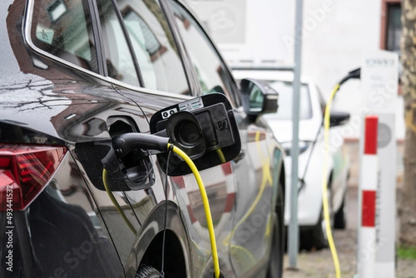 Obraz Elektro-Auto an Ladestation